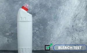 An image with a bottle of bleach and text "bleach test"